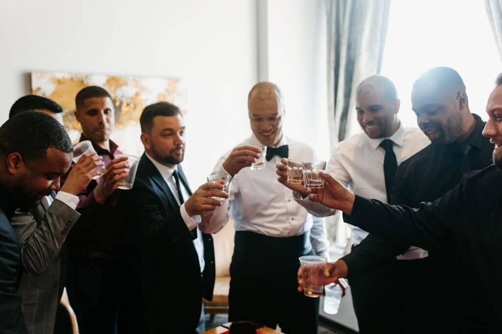 groomsmen toasting at a neuro-friendly wedding