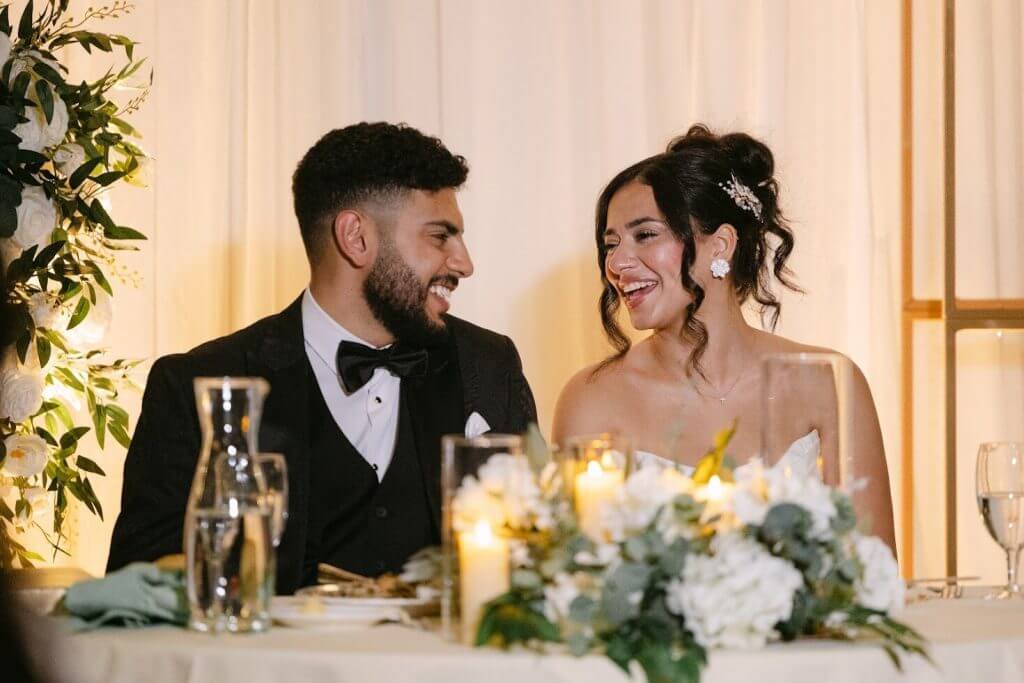 newly wed couple enjoying their reception at the Lumber Exchange